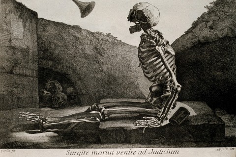 a skeleton sits up in his grave