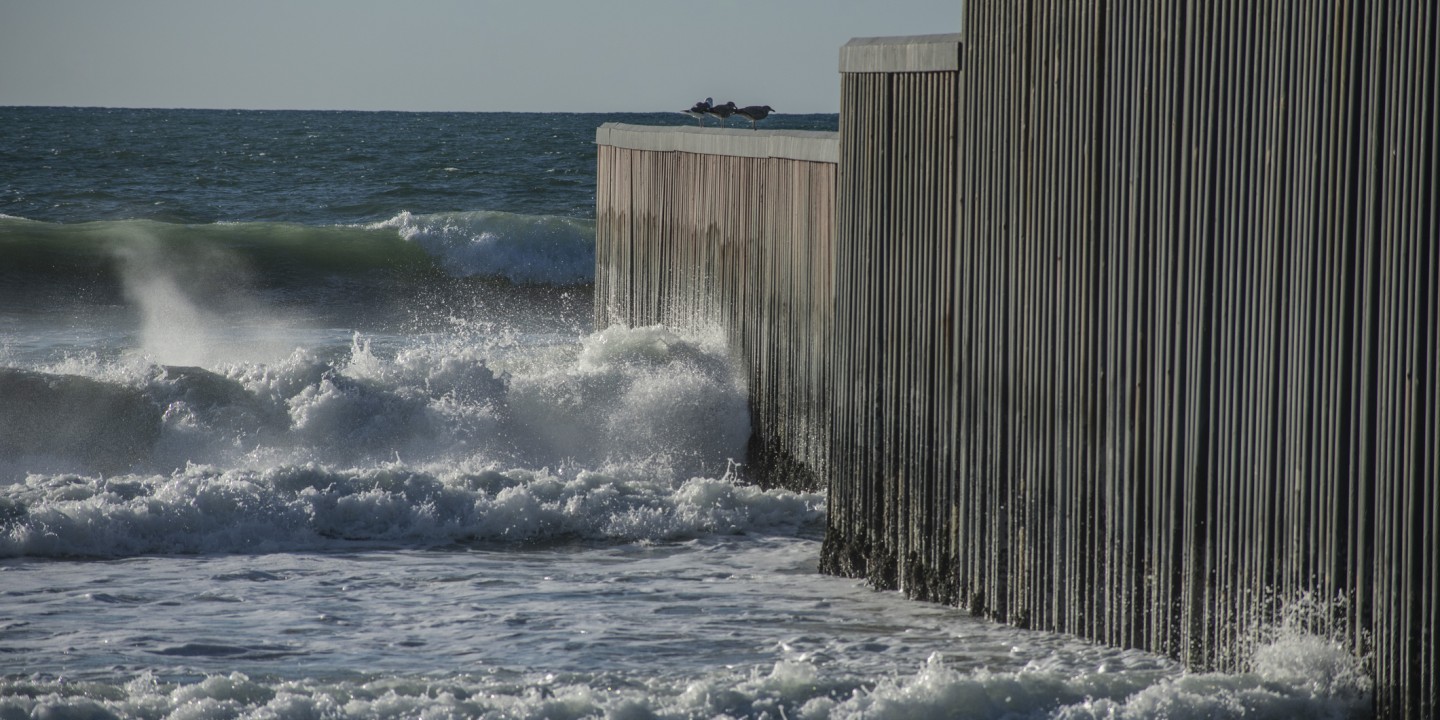 waves at border wall