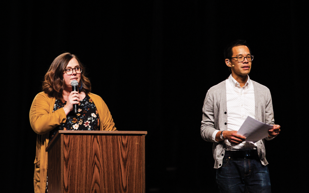 Sarah Bessey and Jeff Chu on a stage