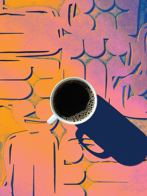 A cup of coffee on a colorful background