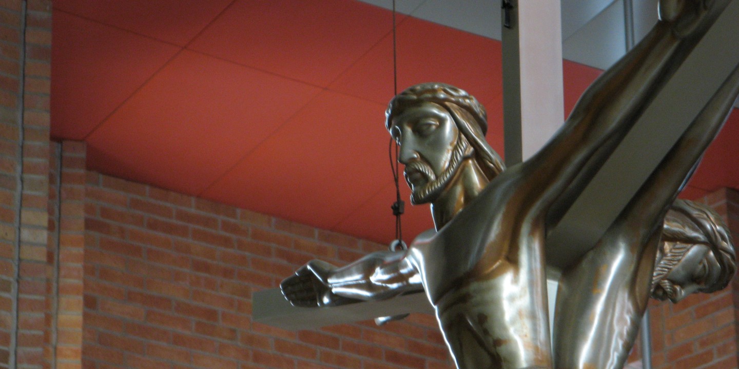 crucifix over an altar